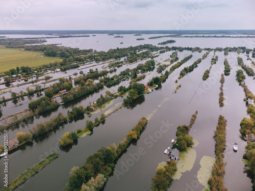 Aerial View of Houses on Loosdrechtse Plassen Lake with Islands and Canals. Scheendijk, Netherlands photo