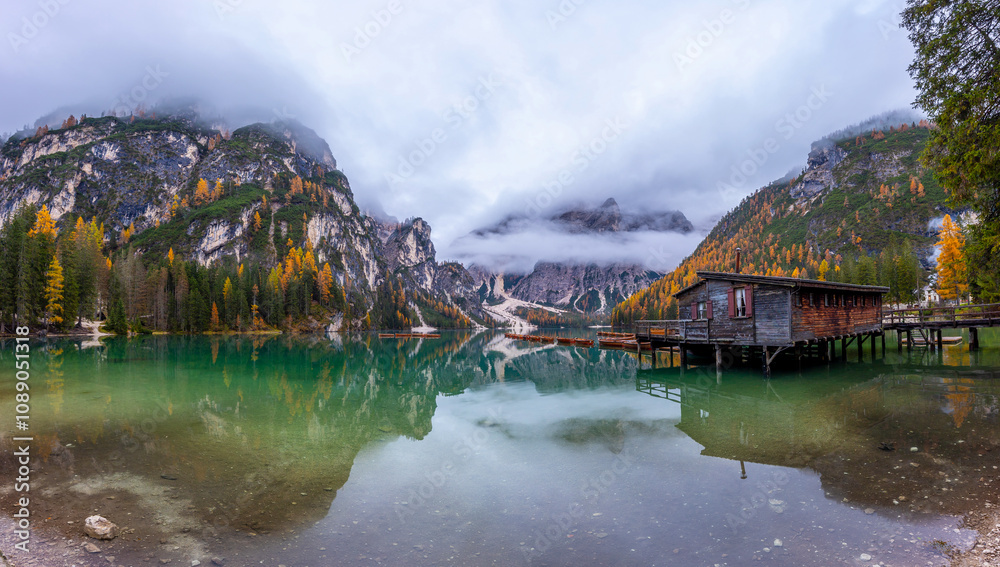 Fototapeta premium Morning reflection at Lago di Braies (Dolomites)