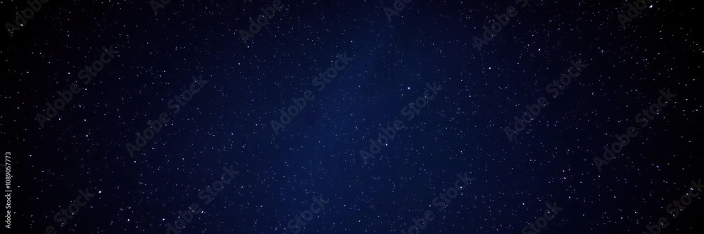 Fototapeta premium An enchanting starry night scene with numerous stars shining brightly against a backdrop of deep indigo and purple hues, cosmos, magical