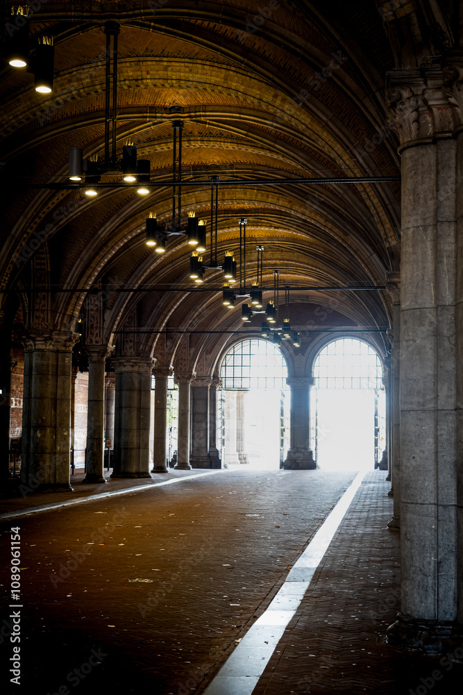 Light tunnel through an old building on the streets of Amsterdam Light tunnel through an old building on the streets of Amsterdam
