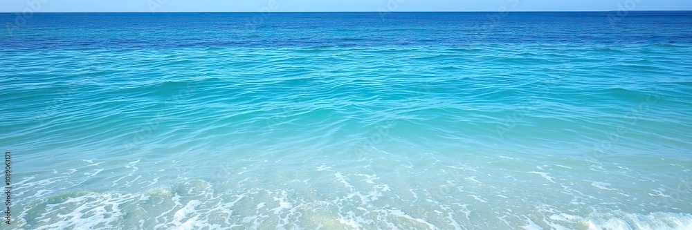 A tranquil ocean scene with gentle lapping waves and a soft blue ocean surface reflecting the clear blue sky above, ocean scenery, serene landscape, turquoise ocean A tranquil ocean scene with gentle lapping waves and a soft blue ocean surface reflecting the clear blue sky above, ocean scenery, serene landscape, turquoise ocean