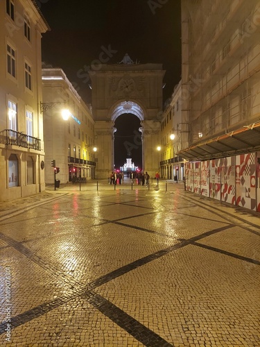 portugal lison apr 28 2024triumphal rua augusta arch Illuminated Historic Archway in Lisbon's Nighttime Cityscape photo