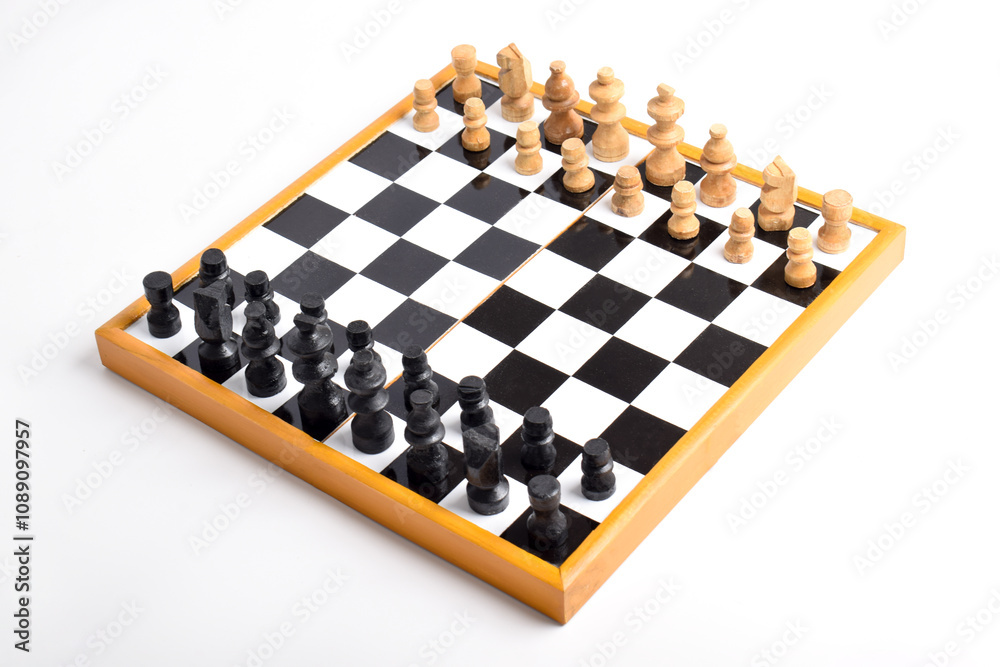 Wooden chessboard with chess pieces ready for the game isolated on white background Wooden chessboard with chess pieces ready for the game isolated on white background