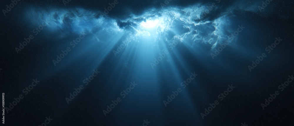 Fototapeta premium A blue sky with a bright light shining through the clouds