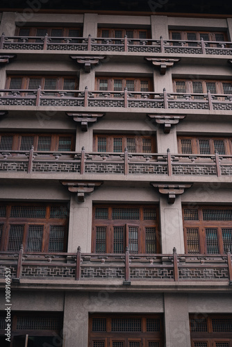 Vertical view of Chinese traditional building in the Jingan Temple in the center of Shanghai, China photo