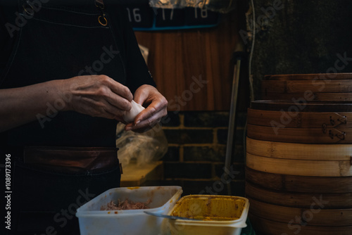 Photography Chef preparing homemade crab meat dumplings at Chinese restaurant in Shanghai, C