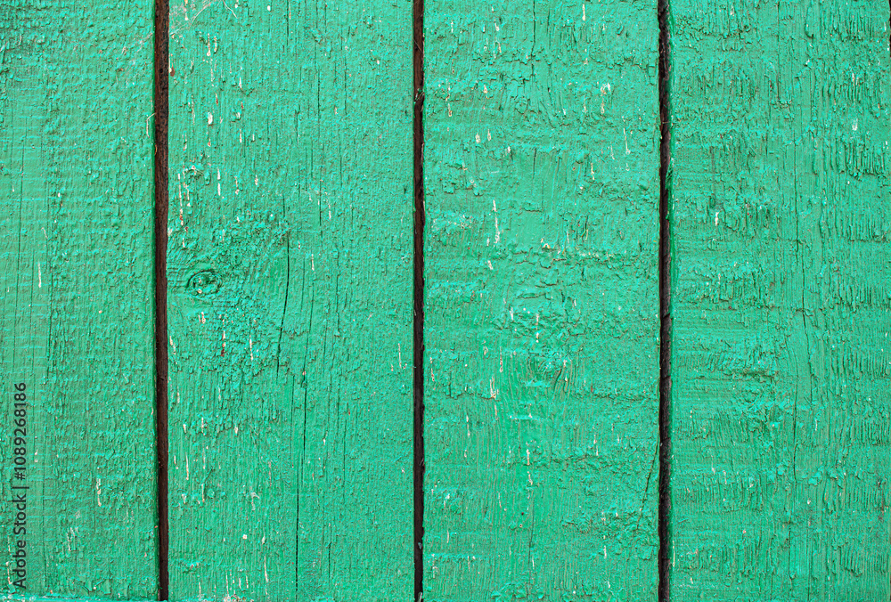 Old wooden green boards as abstract background.