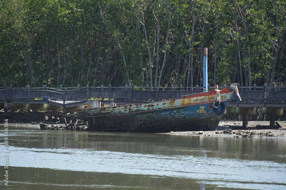 Abandoned fishing boat mangrove forest nature photography calm waters side view serenity and reflection Abandoned fishing boat mangrove forest nature photography calm waters side view serenity and reflection