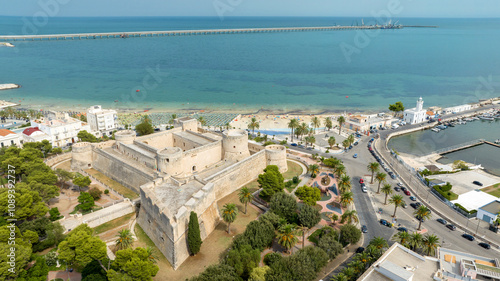 Aerial view of the castle of Manfredonia, in Puglia, Italy. It is a military structure built by the Aragonese and expanded in the eras of Swabian and Angevin domination. In background is Adriatic sea. photo