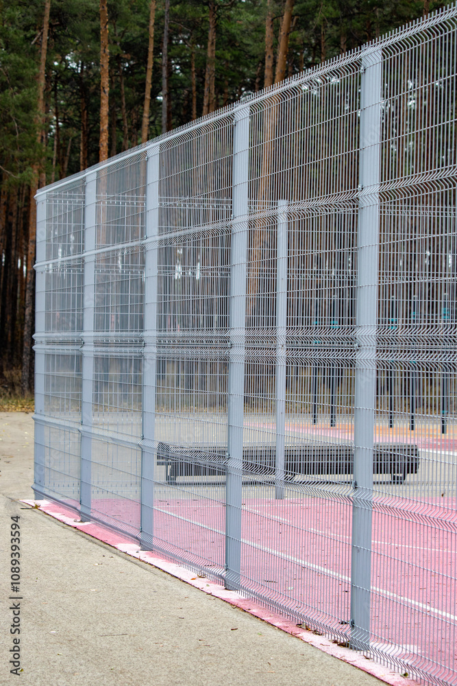 A fence with a clear plastic covering on it