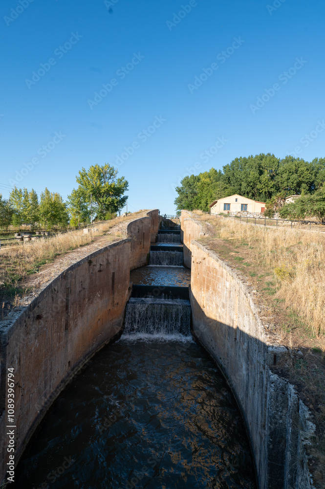 Locks on the Canal de Castilla on the Camino de Santiago Route, stage from Castrojeriz to Fromista in Spain Locks on the Canal de Castilla on the Camino de Santiago Route, stage from Castrojeriz to Fromista in Spain