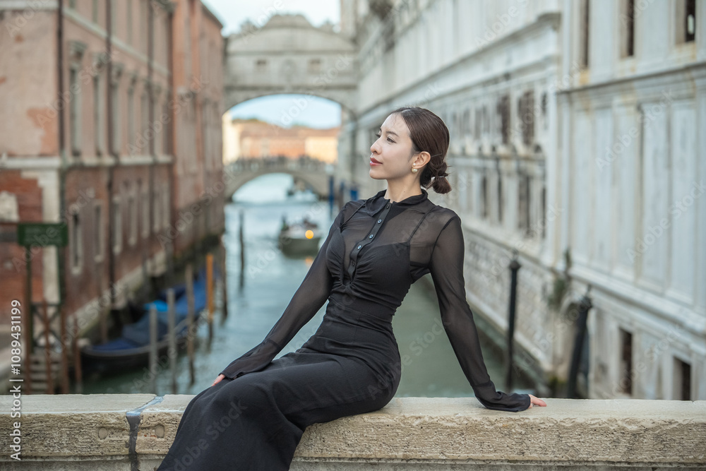 Woman with view bridge of Sighs (Ponte dei Sospiri). Venice, Italy. Woman with view bridge of Sighs (Ponte dei Sospiri). Venice, Italy.