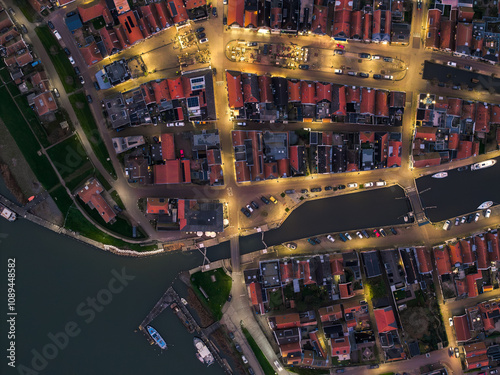 Night aerial drone image of Frisian town Makkum top down, topdown photo