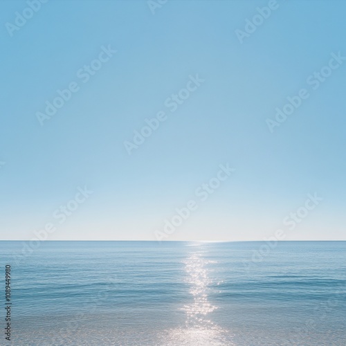 calm ocean view with clear blue sky and gentle waves