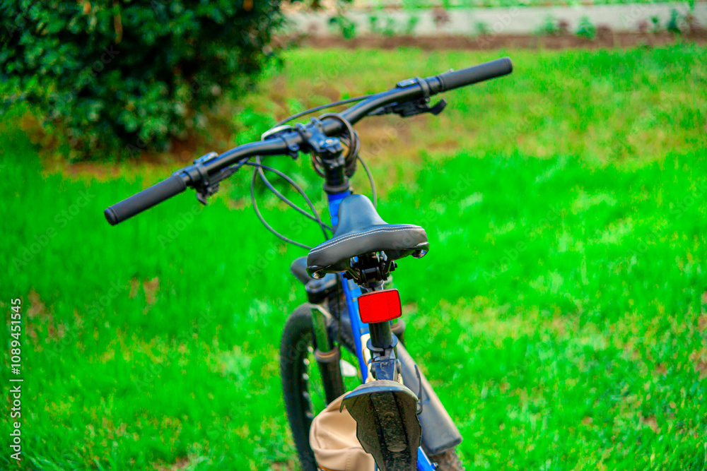 Sport bike. A vehicle on two wheels. two wheels. Pedals on the steering wheel For sports and tourism. Advertising concept.beautiful sitting. Sport bike. A vehicle on two wheels. two wheels. Pedals on the steering wheel For sports and tourism. Advertising concept.beautiful sitting.