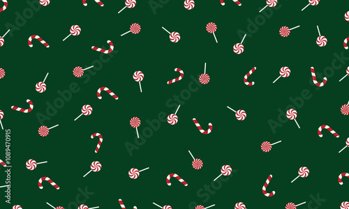 Winter holiday concept.Christmas and New Year banner,poster withcandy cane and lollipops.Christmas design for wrapping paper,greeting card.Holiday pattern  isolated on green background.