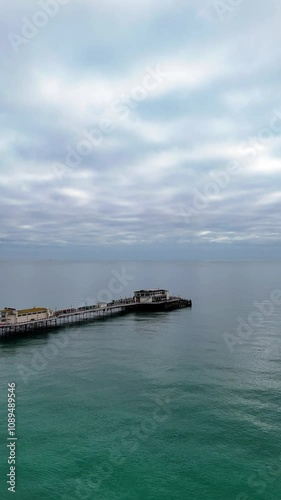 Worthing Pier 4k Drone Aerial Shot of Empty, Temporarily Closed Pier - Calm Seas