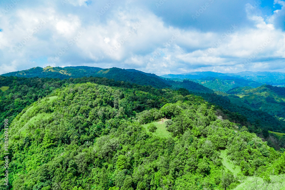 Obraz premium Exploring lush green landscapes mountain range aerial photography natural environment scenic view outdoor adventure