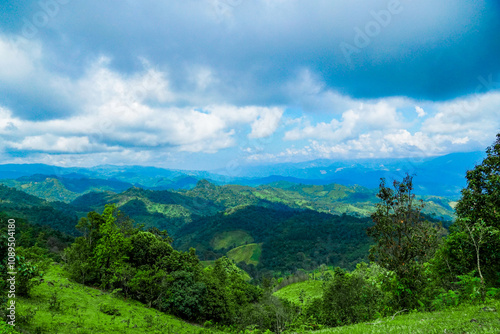 Breathtaking mountain view lush green hills natural landscape serene environment wide angle tranquility in nature