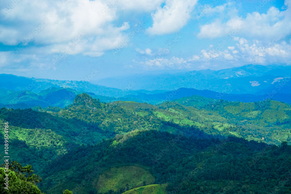 Naklejka premium Breathtaking mountain landscape tropical region nature photography verdant hills aerial view serenity and beauty for nature lovers