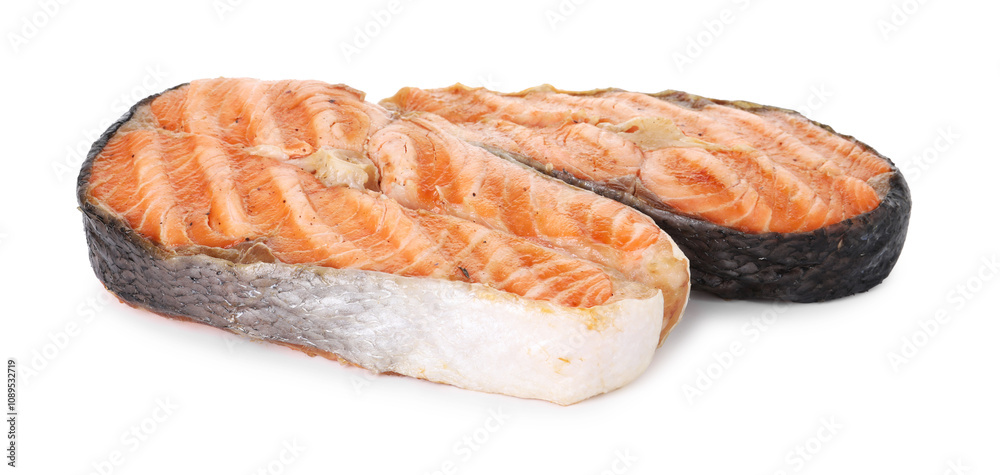 Tasty grilled salmon steaks isolated on white Tasty grilled salmon steaks isolated on white