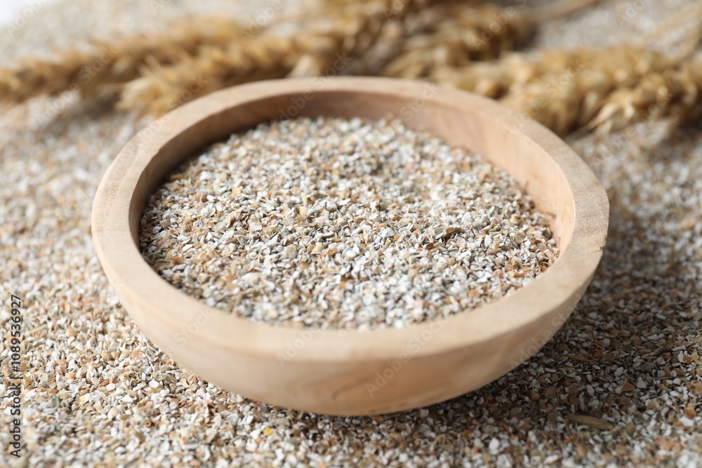 Bowl with fresh rye bran, closeup view Bowl with fresh rye bran, closeup view