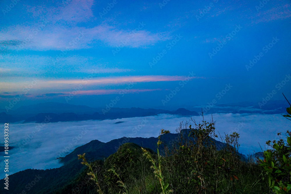 Stunning sunrise over misty mountains nature photography scenic view tranquil environment landscape concept for adventure seekers