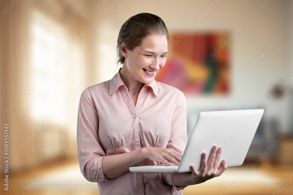 Happy IT worker use laptop computer at home Happy IT worker use laptop computer at home