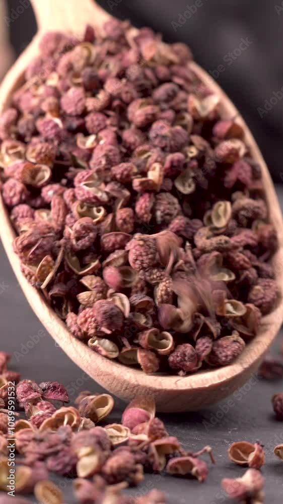 4K Close up of traditional Chinese spice. Sichuan peppercorns. Sichuan pepper often used in Chinese and Asian cooking for spicy meals 4K Close up of traditional Chinese spice. Sichuan peppercorns. Sichuan pepper often used in Chinese and Asian cooking for spicy meals