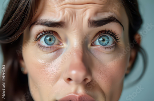 Close-Up Female Face - Anxiety, Gaze of Concern, Pain, Desperation, Blue Eyes, Help, Safety, Protect Women