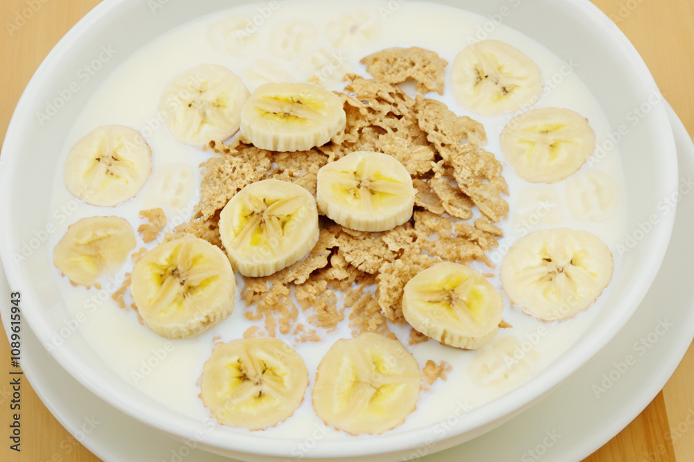 A bowl of cereal with bananas and milk. A banana, milk, and milk cereal with fruit. Cereal milk fruit banana breakfast slice plate. A plate of cereal, bananas, and a lifestyle slice of banana. A bowl of cereal with bananas and milk. A banana, milk, and milk cereal with fruit. Cereal milk fruit banana breakfast slice plate. A plate of cereal, bananas, and a lifestyle slice of banana.