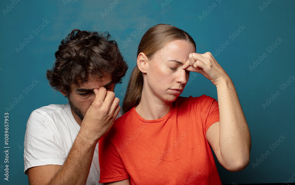 feeling stressed, unhappy and frustrated, touching forehead and suffering migraine of severe headache feeling stressed, unhappy and frustrated, touching forehead and suffering migraine of severe headache