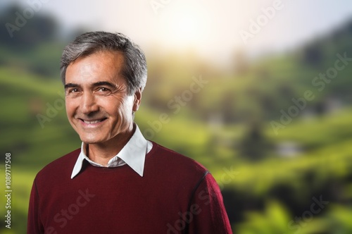 Senior man at field in summer adventure
