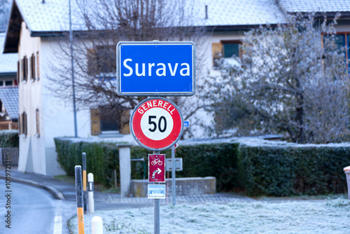 Mountain village of Surava with traffic signs and sign energy town on a sunny autumn day. Photo taken November 15th, 2024, Surava Albula, Switzerland. photo