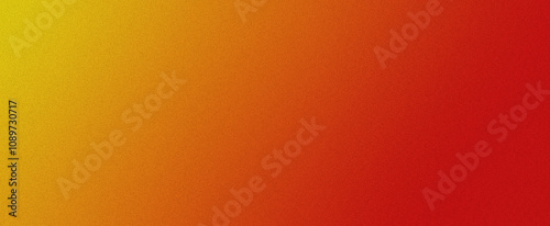 Yellow orange and red grainy gradient abstract background photo