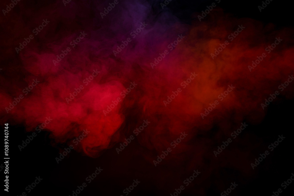 Fototapeta premium Orange and red steam on a black background.
