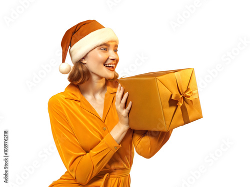 Obraz na płótnie Portrait of young beautiful woman with red Santa Claus hat holding gift isolated on transparent background, festive people, Christmas w salonie