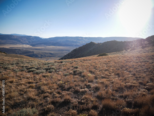 Sage brush and rolling hills in Kremmling Colorado at sunset overlooking Muddy Creek photo