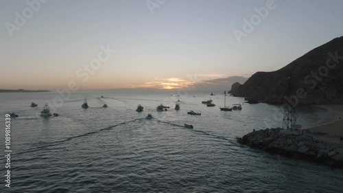 Fishing Boats Leaving at Sunrise in Cabo San Lucas Baja California Sur Mexico Sunny Beaches Whales Yachts and Boats photo