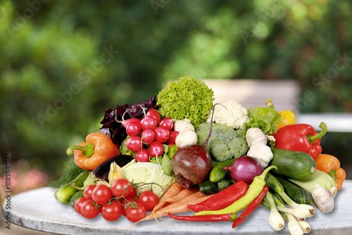 Many different fresh healthy food vegetables and ftuits photo