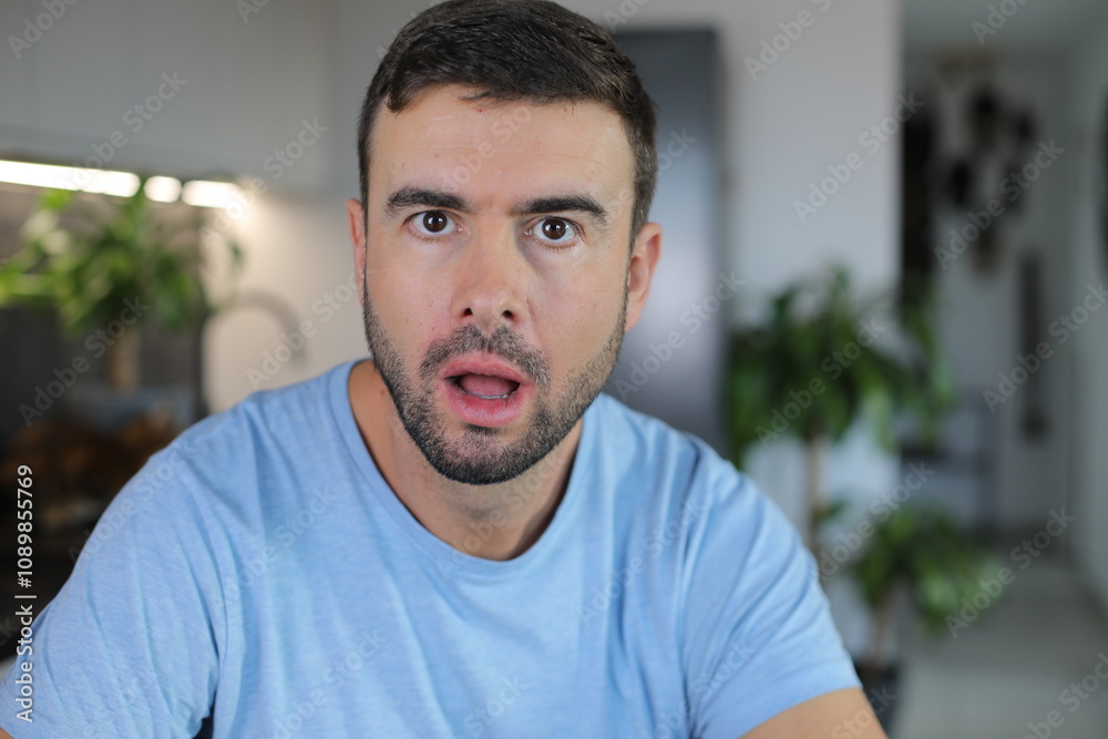 Fototapeta premium Man looking at something with lots of concern 