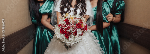 Photography woman in wedding dress and bridesmaids
