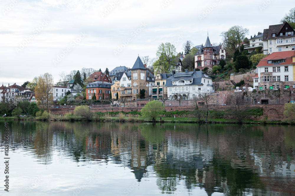 Fototapeta premium Heidelberg, Germany - 31.03.2024 - View of Beautiful Heidelberg, Reflection in Neckar River, Easter 2024