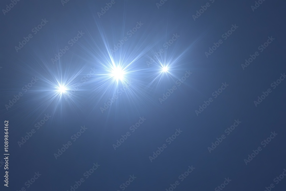 Obraz premium Subtle glowing starbursts on a gradient navy-blue background
