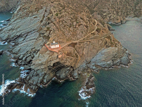 Aerial landscape of mountains and lighthouse of Cadaques Village during summer Costa Brava