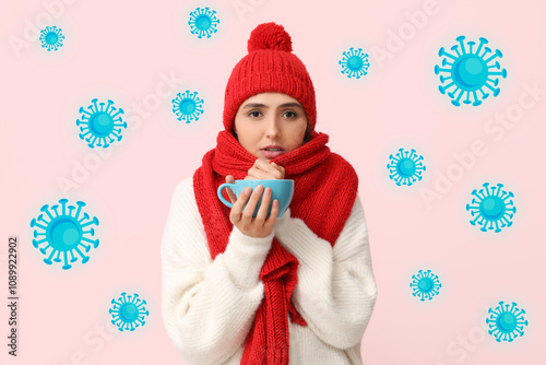 Sick young woman with cup o...
