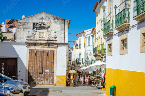 Beautiful cozy street and buildings in old town Evora, Portugal photo