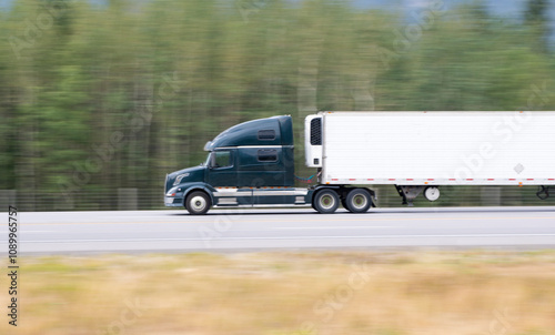 Wallpaper Mural Heavy Cargo on the Road. A truck hauling freight along a highway. Taken in Alberta, Canada Torontodigital.ca