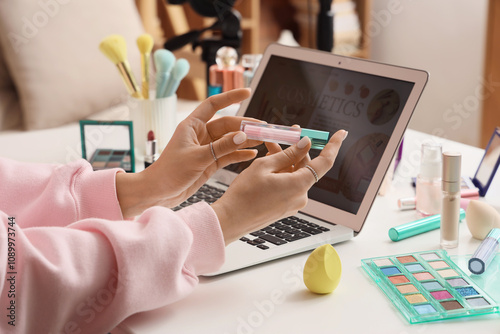 Female beauty blogger with ...