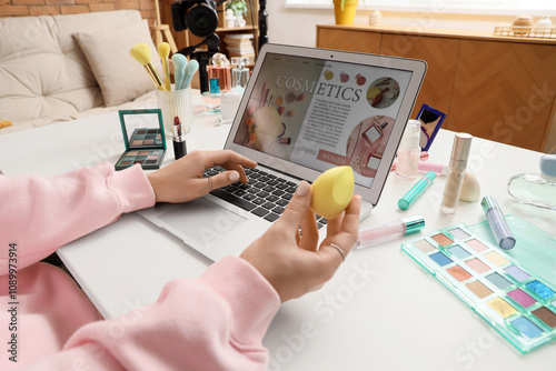 Female beauty blogger with ...